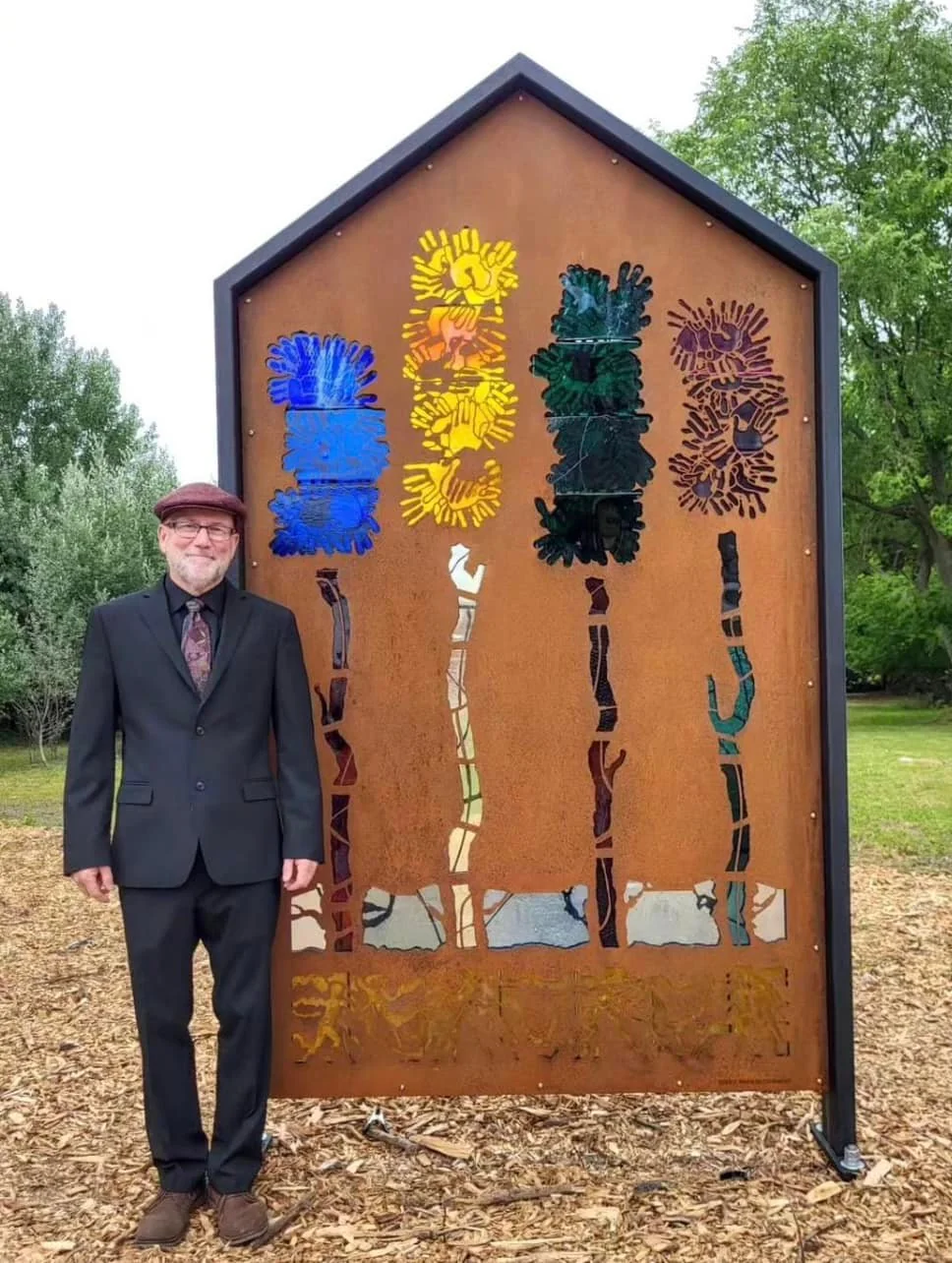 Four Skinny Trees sculpture by Bay City artist Mark Bleshenski